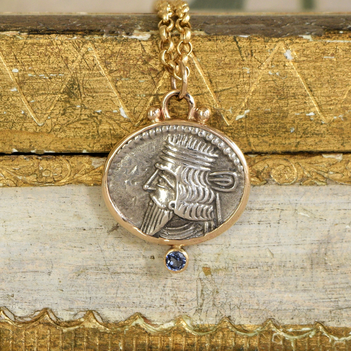 Ancient parthian coin and sapphire pendant with 14k gold