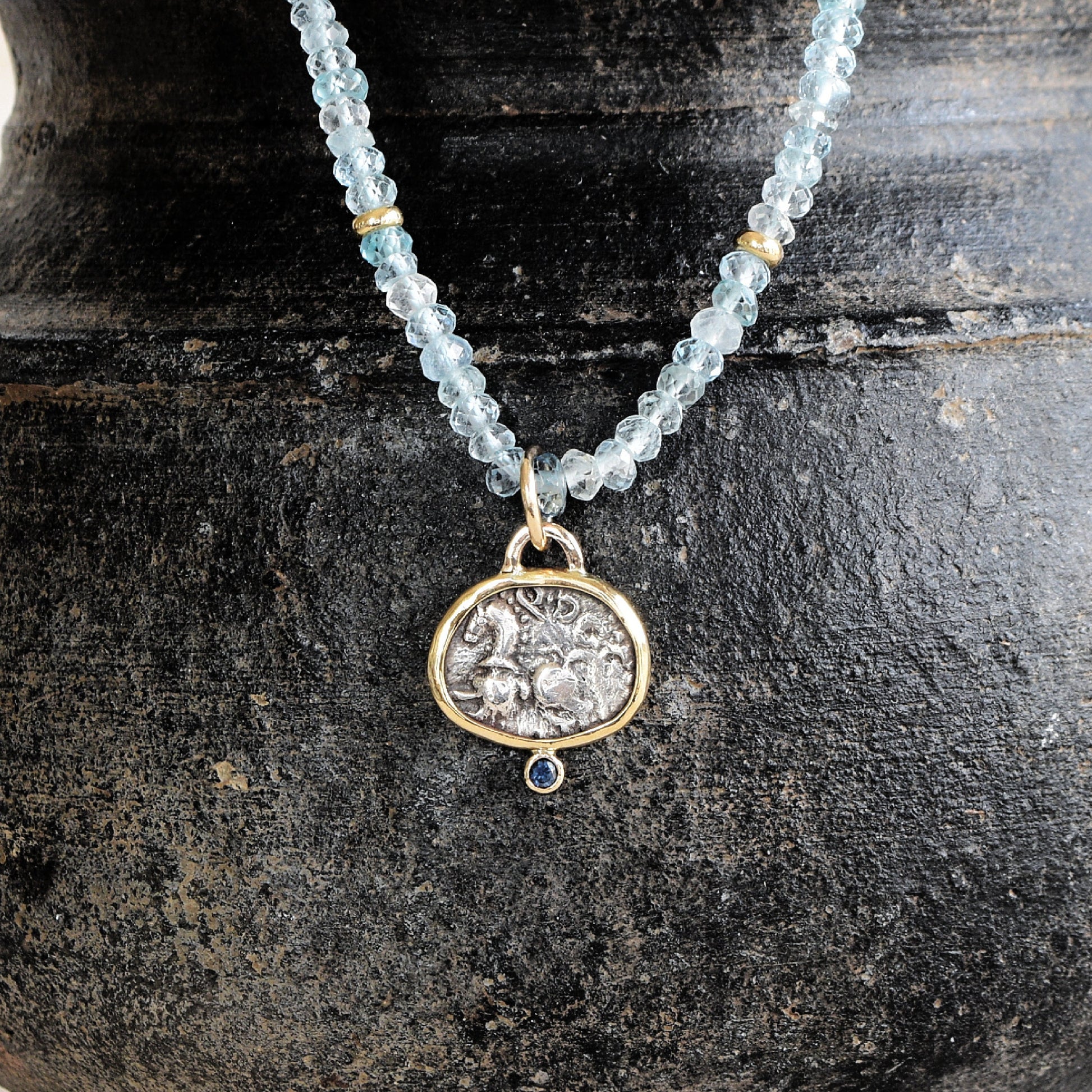 Ancient celtic coin pendant with horse and blue sapphire, 14k gold