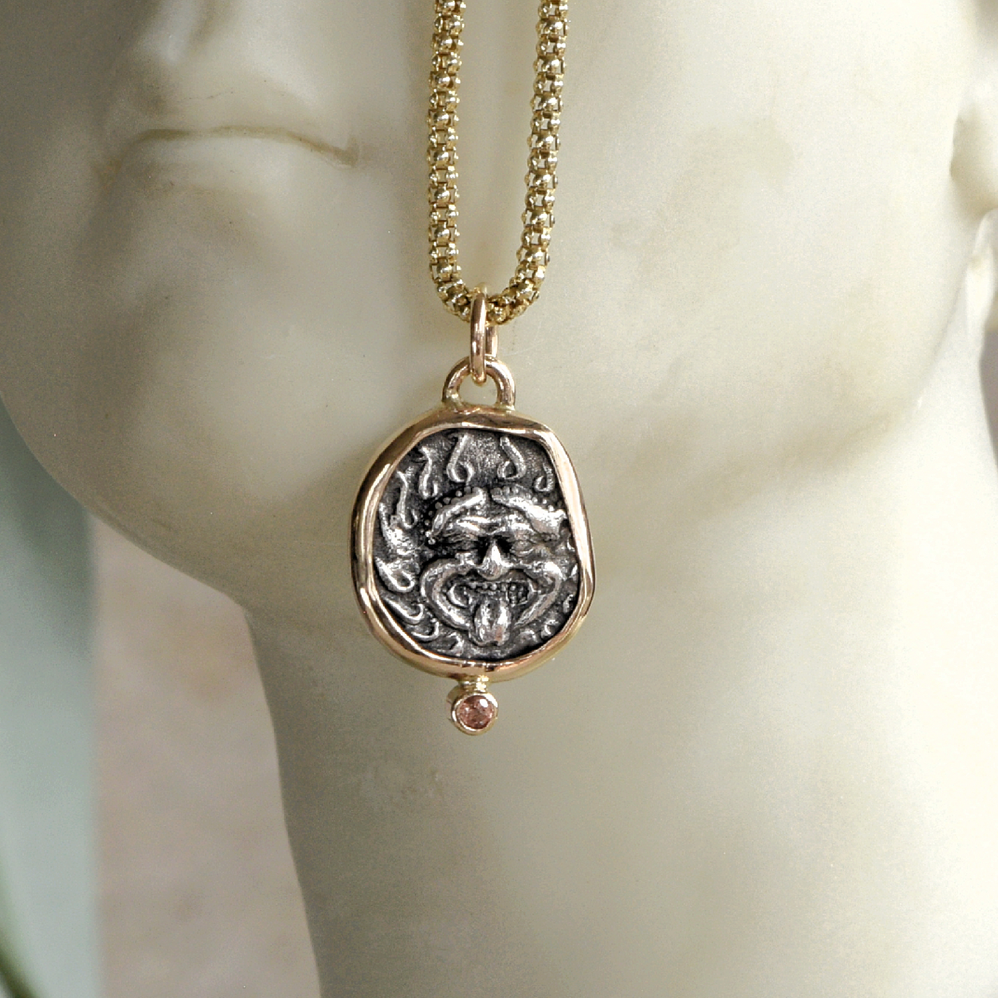 Gorgon Madusa coin pendant with Pink Sapphire and Gold